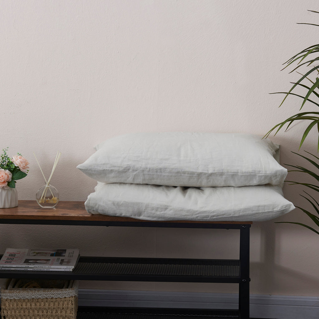 Pair of Cool Gray Linen Housewife Pillowcases on Bench