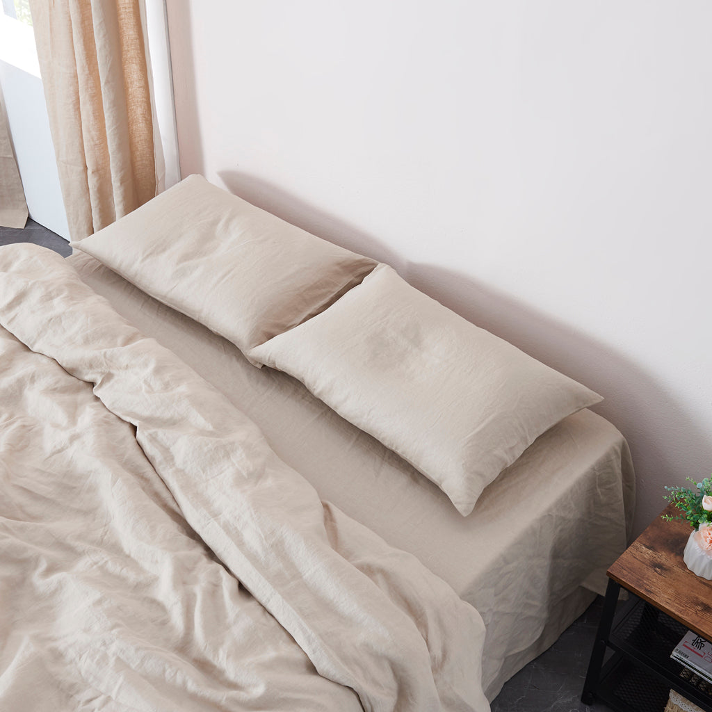 Natural Linen Housewife Pillowcases On Bed