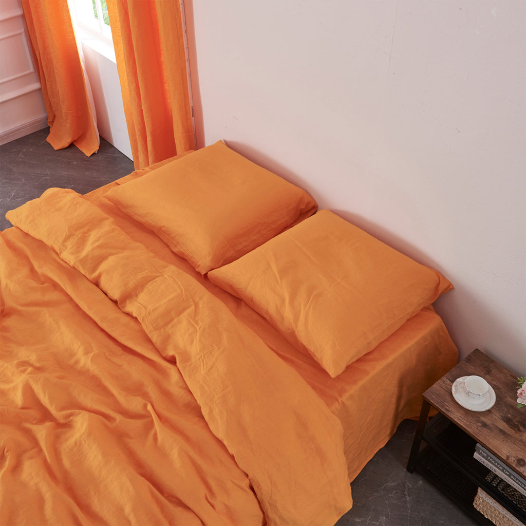 Tangelo Orange Linen Housewife Euro Pillowcases on Bed