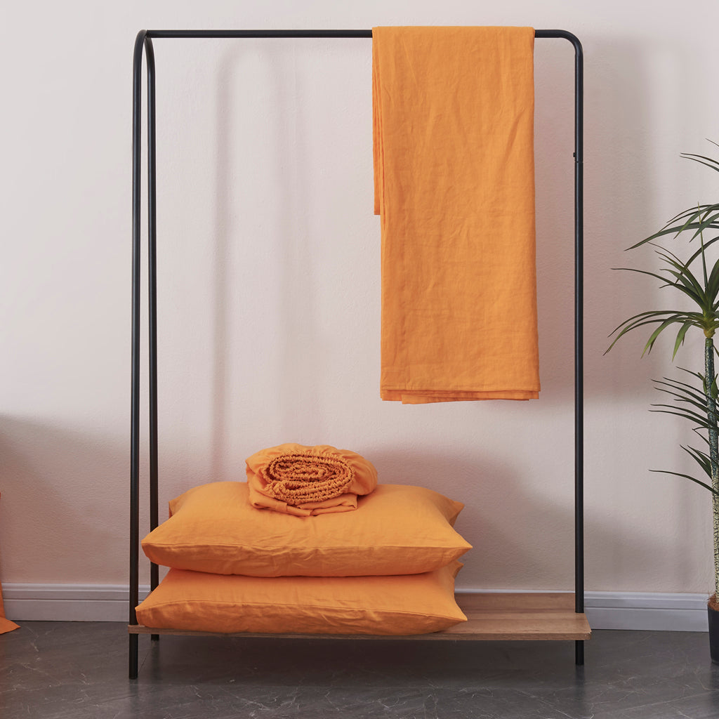 Tangelo Linen Sheet Set on Rack