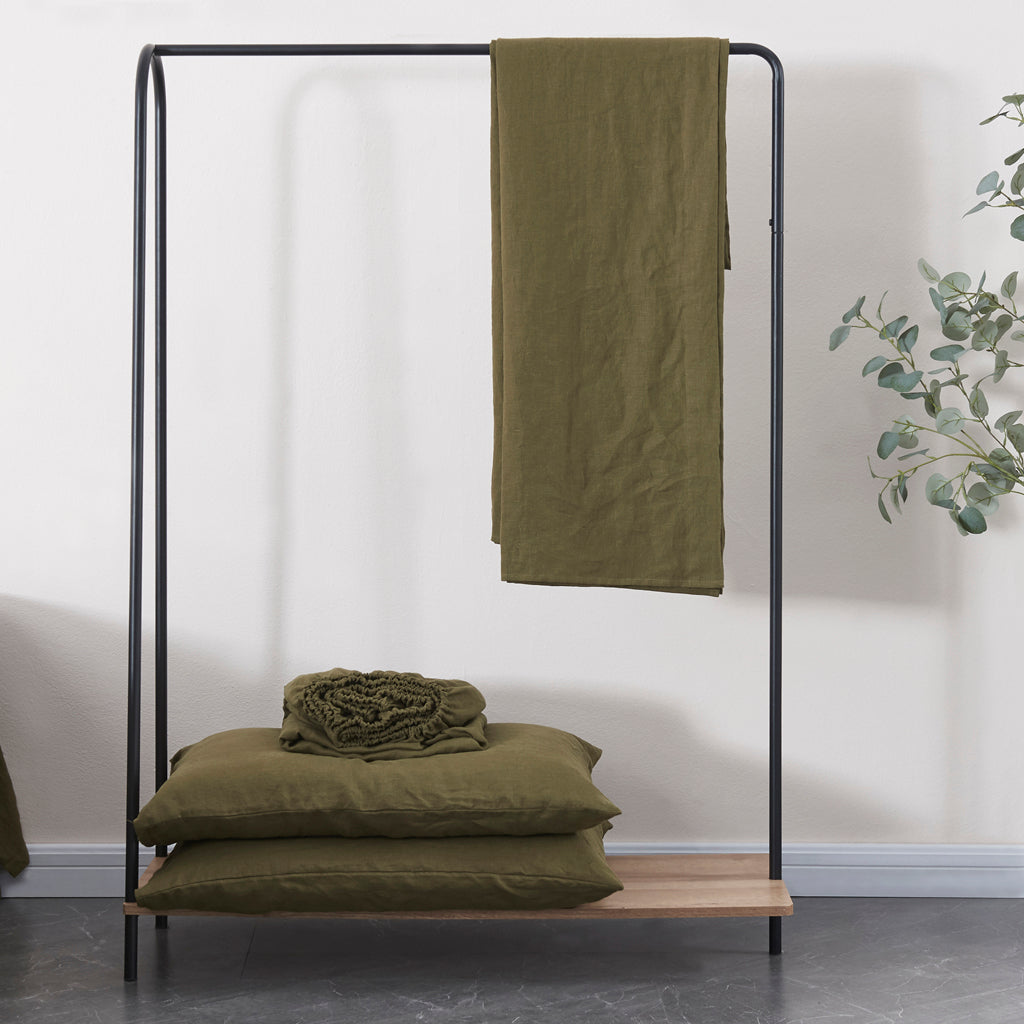 Linen Sheets Set in Green Olive on Rack