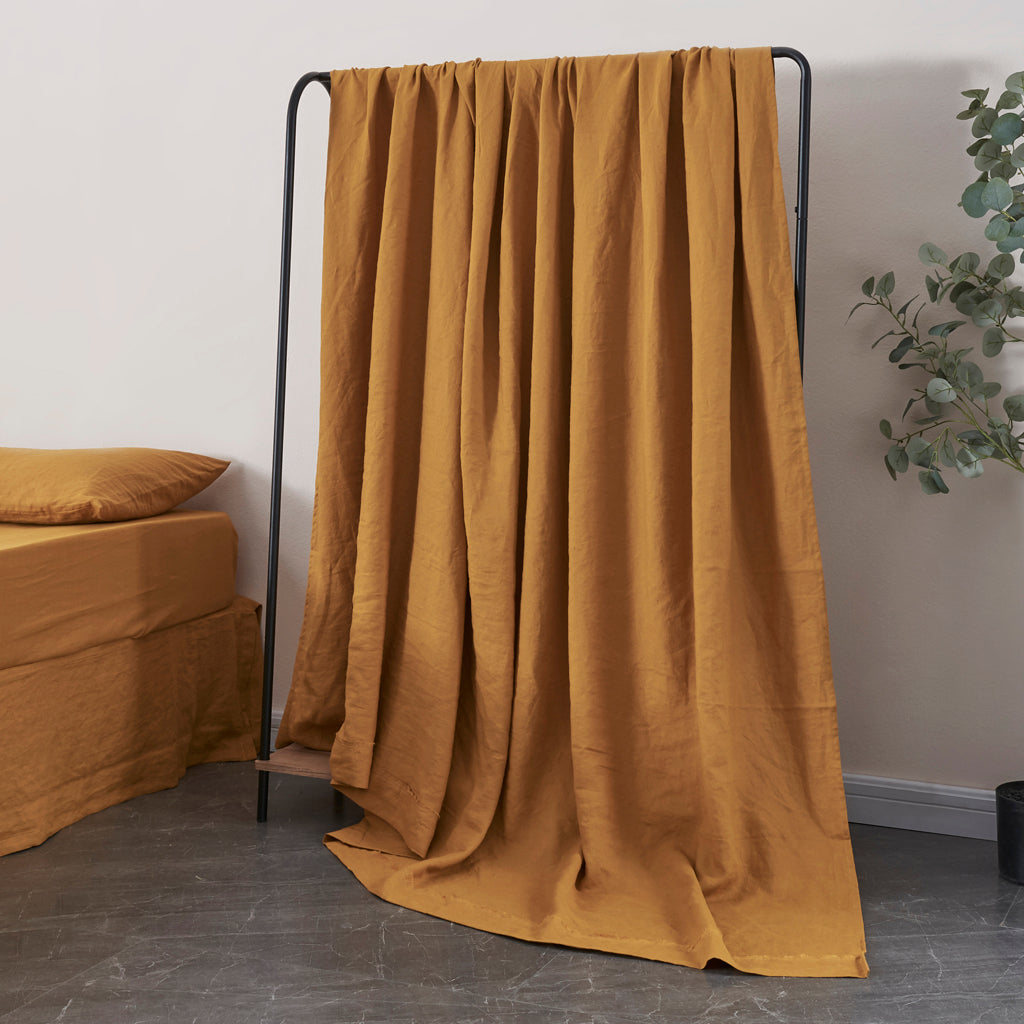 100% Linen Mustard Yellow Flat Sheet on Shelf