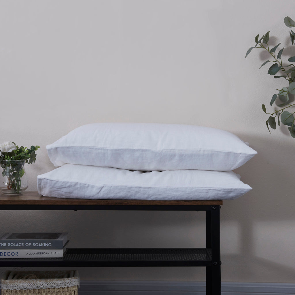 Optic White Linen Housewife Pillowcases on Bench