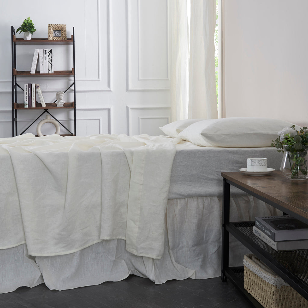Close Up Of 100% Linen Ivory White Flat Sheet on Bed