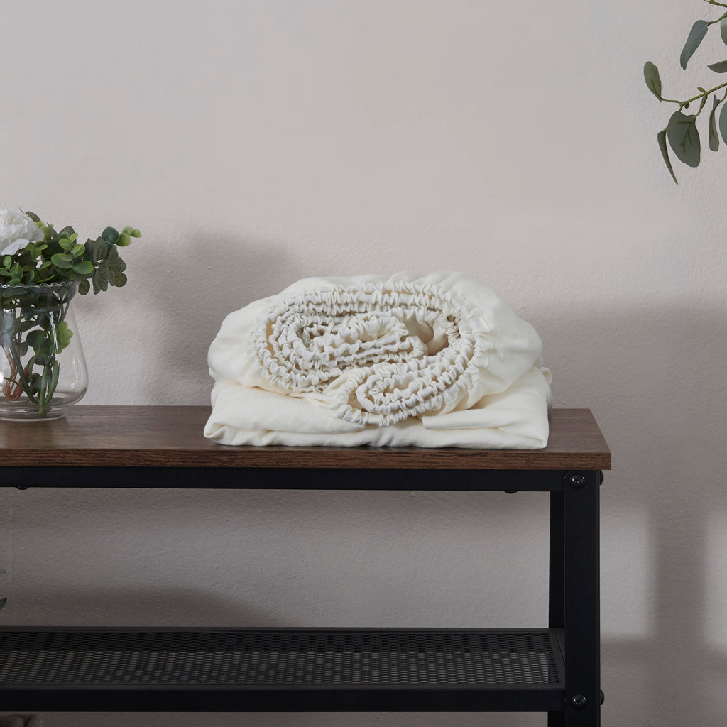 Ivory Linen Fitted Sheet Folded on Shelf