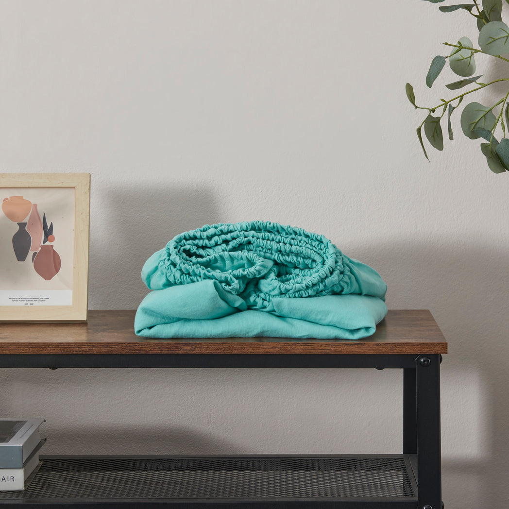 Aqua Green Linen Fitted Sheet Folded on Shelf