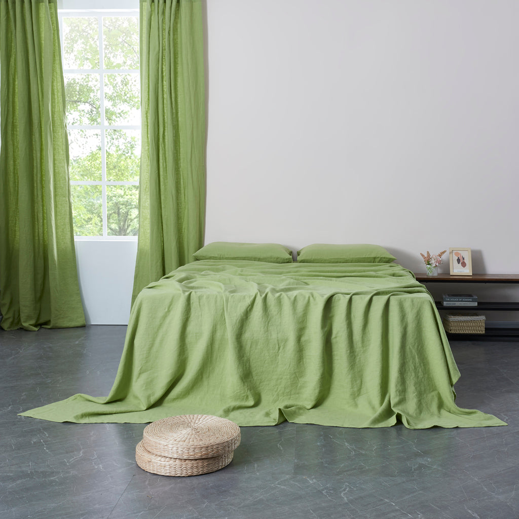 Matcha Linen Flat Sheet on Bed