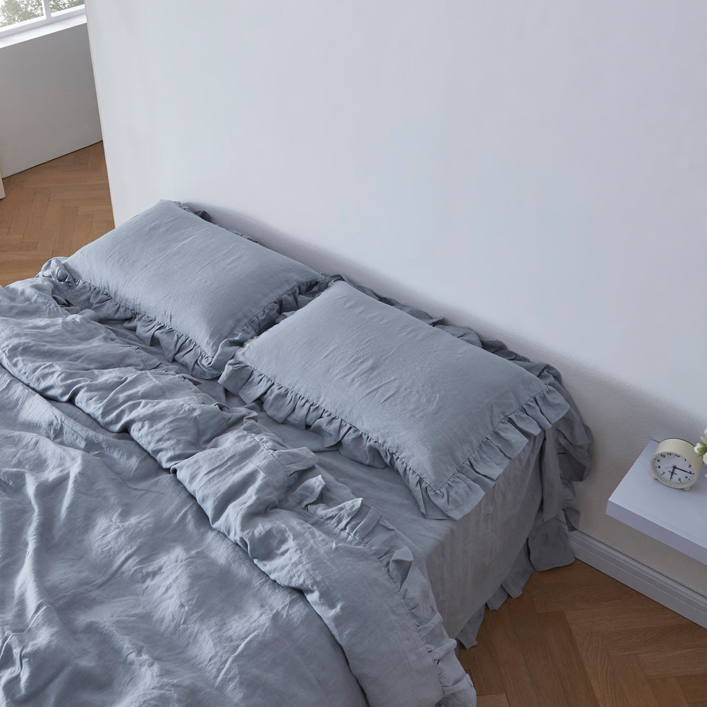 Alloy Gray Ruffle Hem Linen Pillowcases on Bed