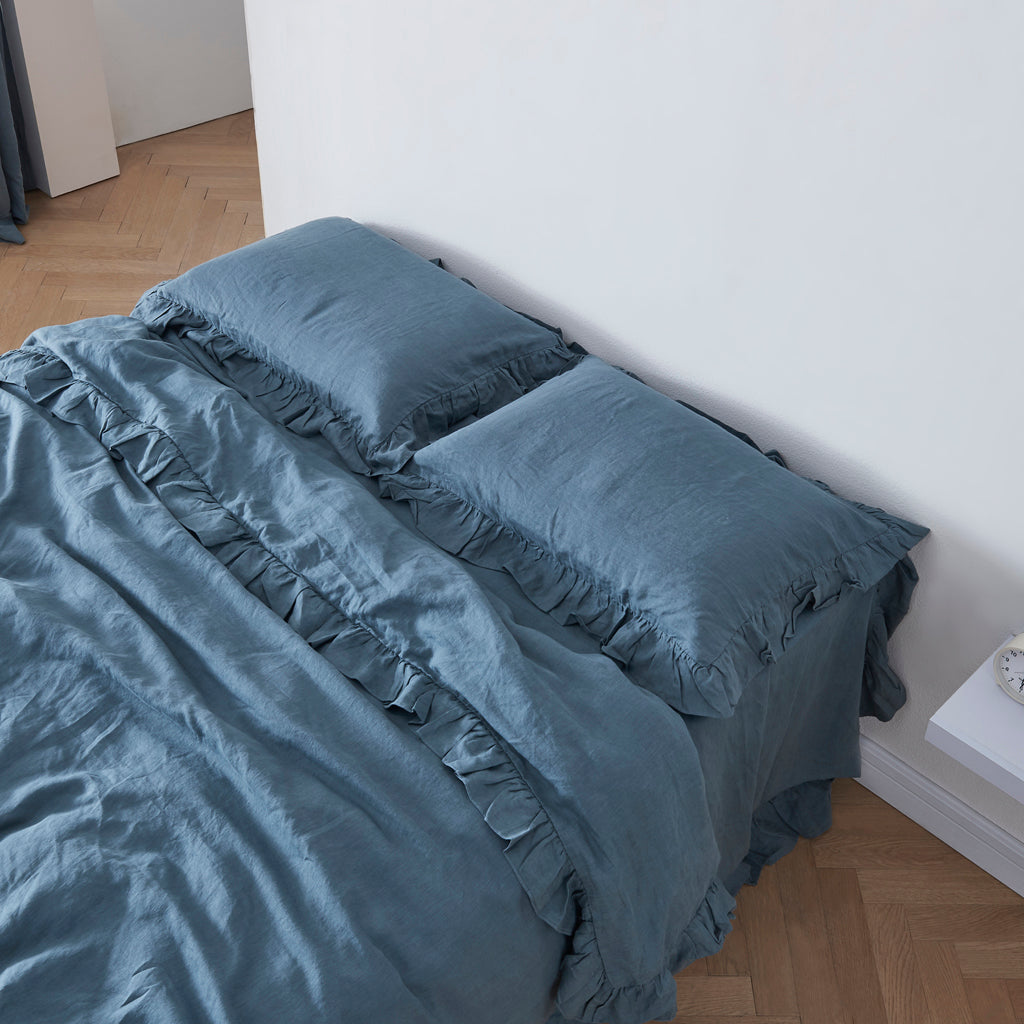 French Blue 100% Linen Ruffle Hem Pillowcases On Bed - linenforce
