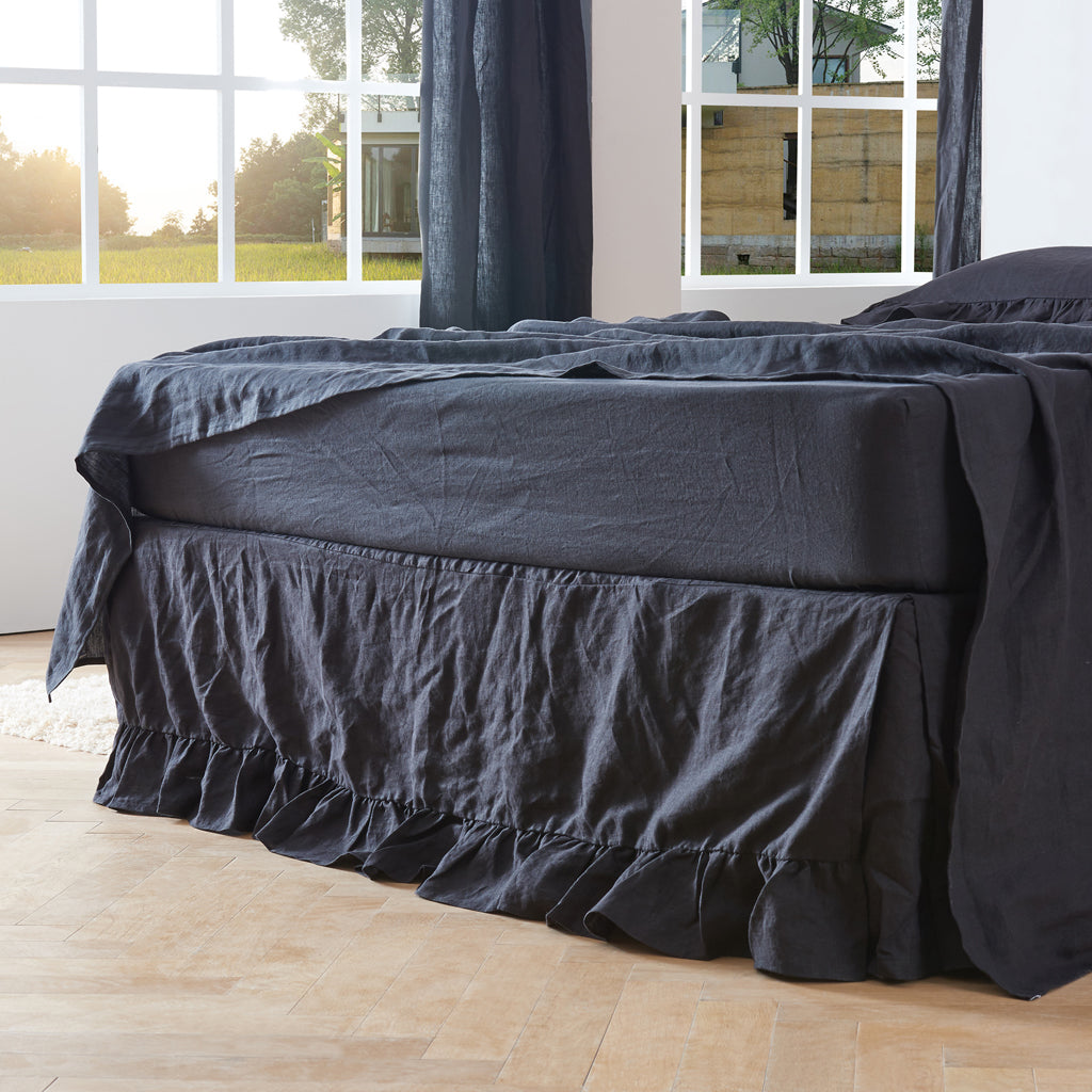 Black Linen Bedskirt with Ruffled Hem on Bed