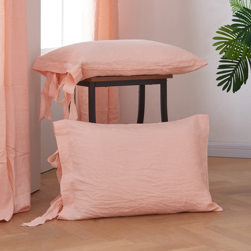 Peach 100% Linen Bow Ties Pillowcases On Floor - linenforce