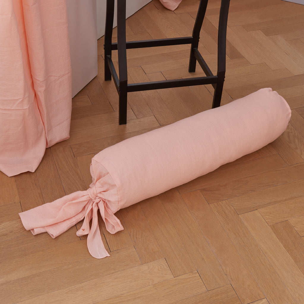Peach 100% Linen Bow Ties Bolster On Bed - linenforce