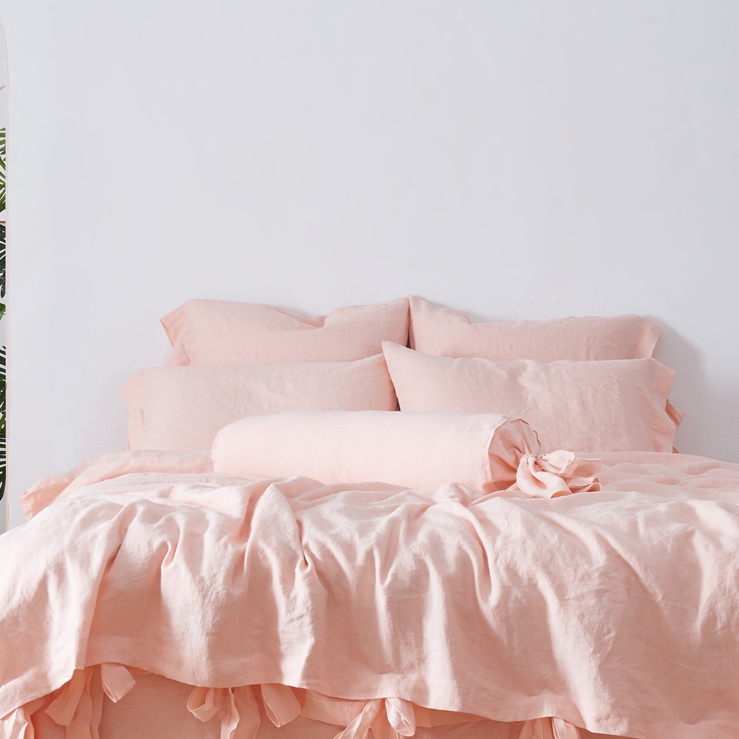 Peach 100% Linen Bow Ties Pillowcases On Bed - linenforc