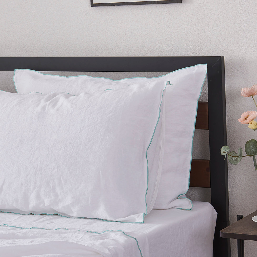 White Linen Pillowcases with Embroidered Aqua Edge Detail