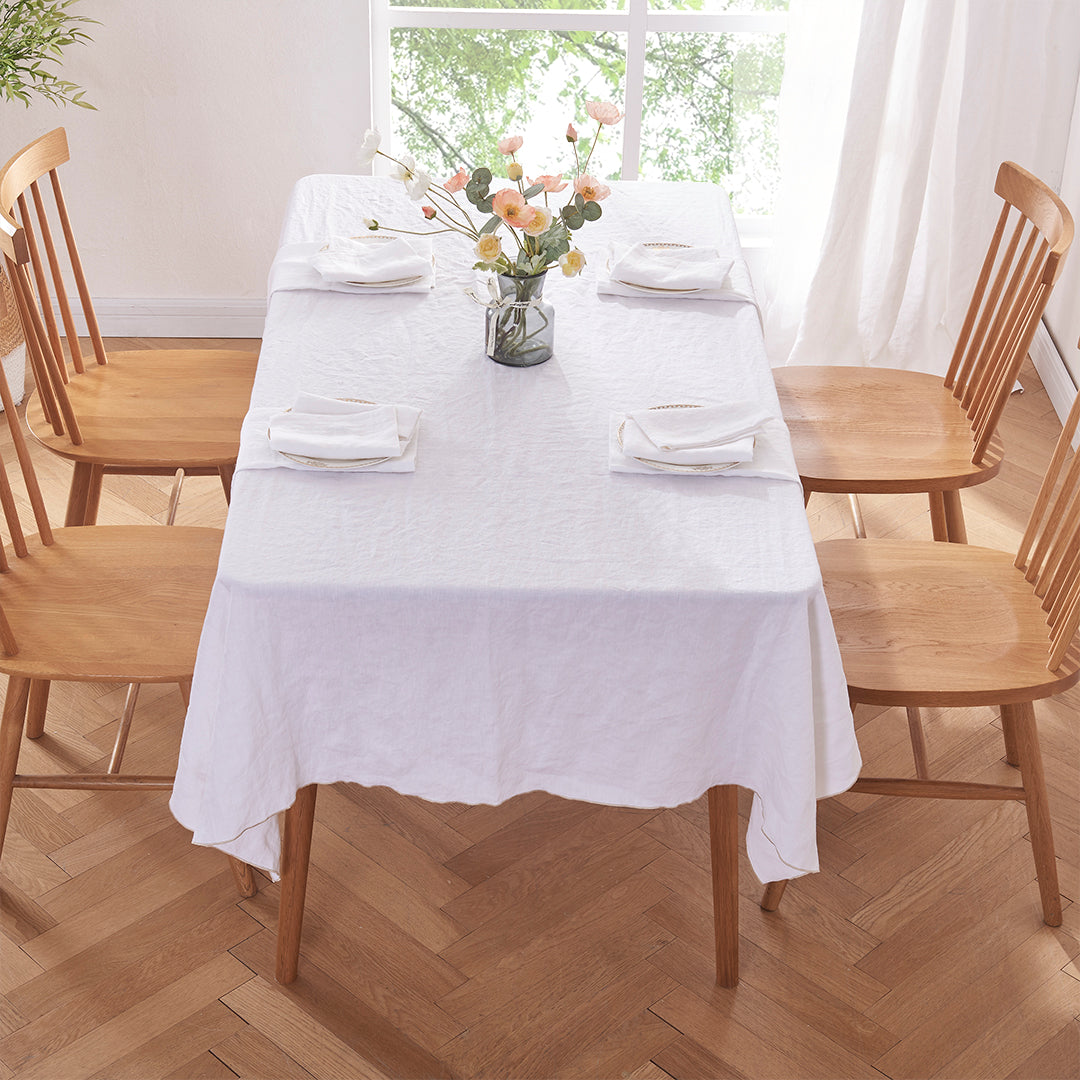 Dining Table with 100% Linen White Tablecloth with Beige Embroidered Edge