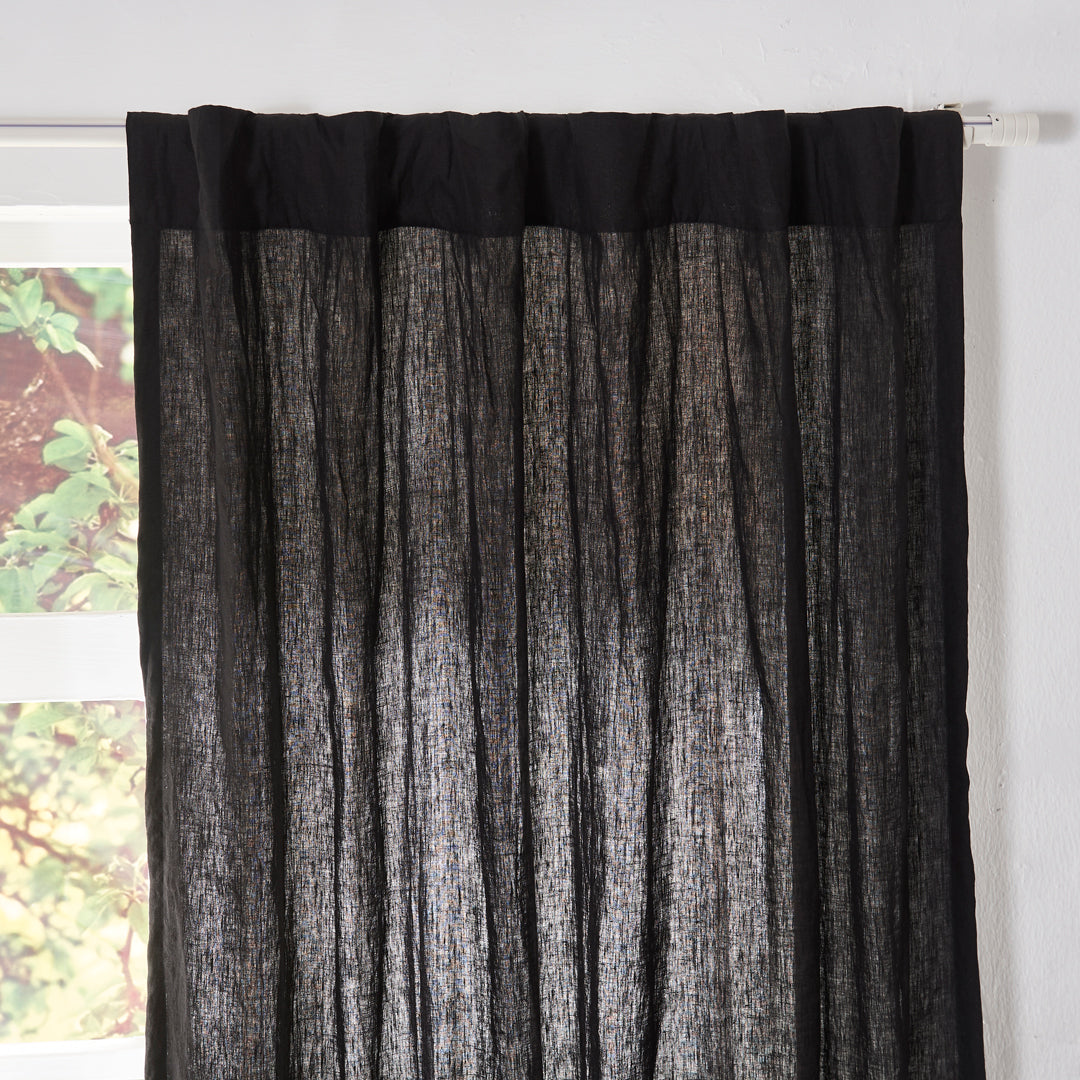 Top of Black Linen Curtains with Cotton Lining on Window