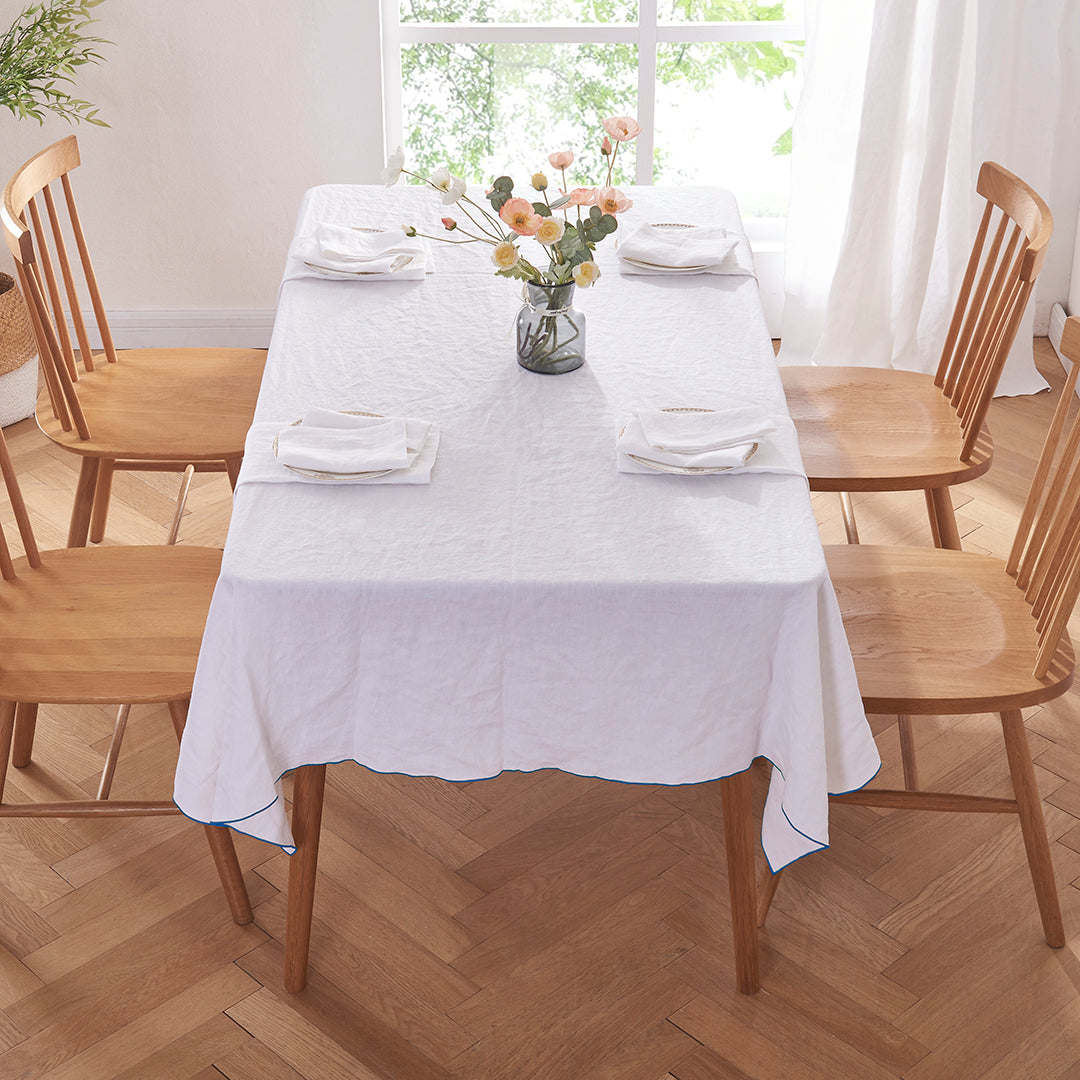 Dining Room Table with Brilliant Blue Edge Embroidered Linen Tablecloth