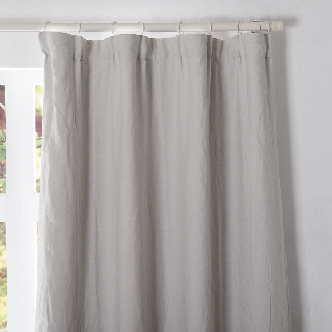 Top of Cool Gray Linen Curtain Hung with Curtain Rings