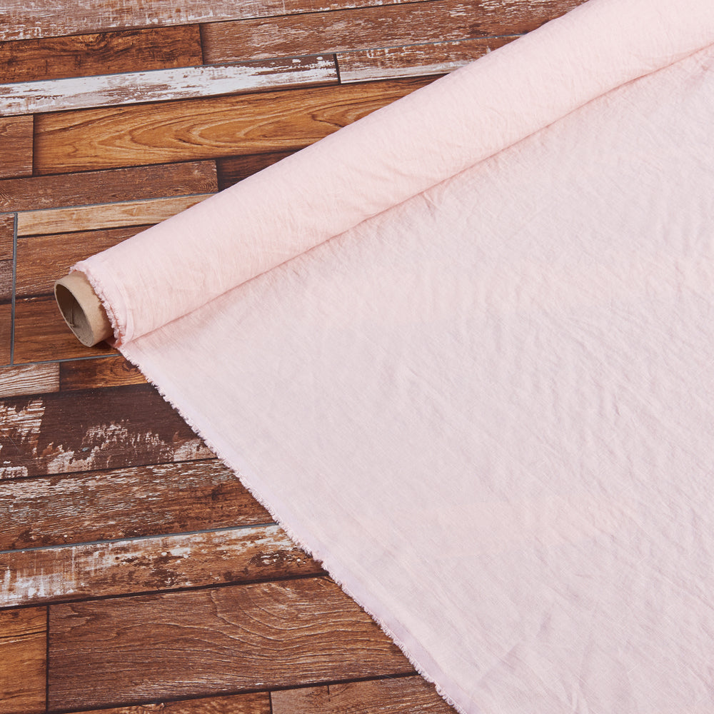 Roll of 100% linen fabric in peach