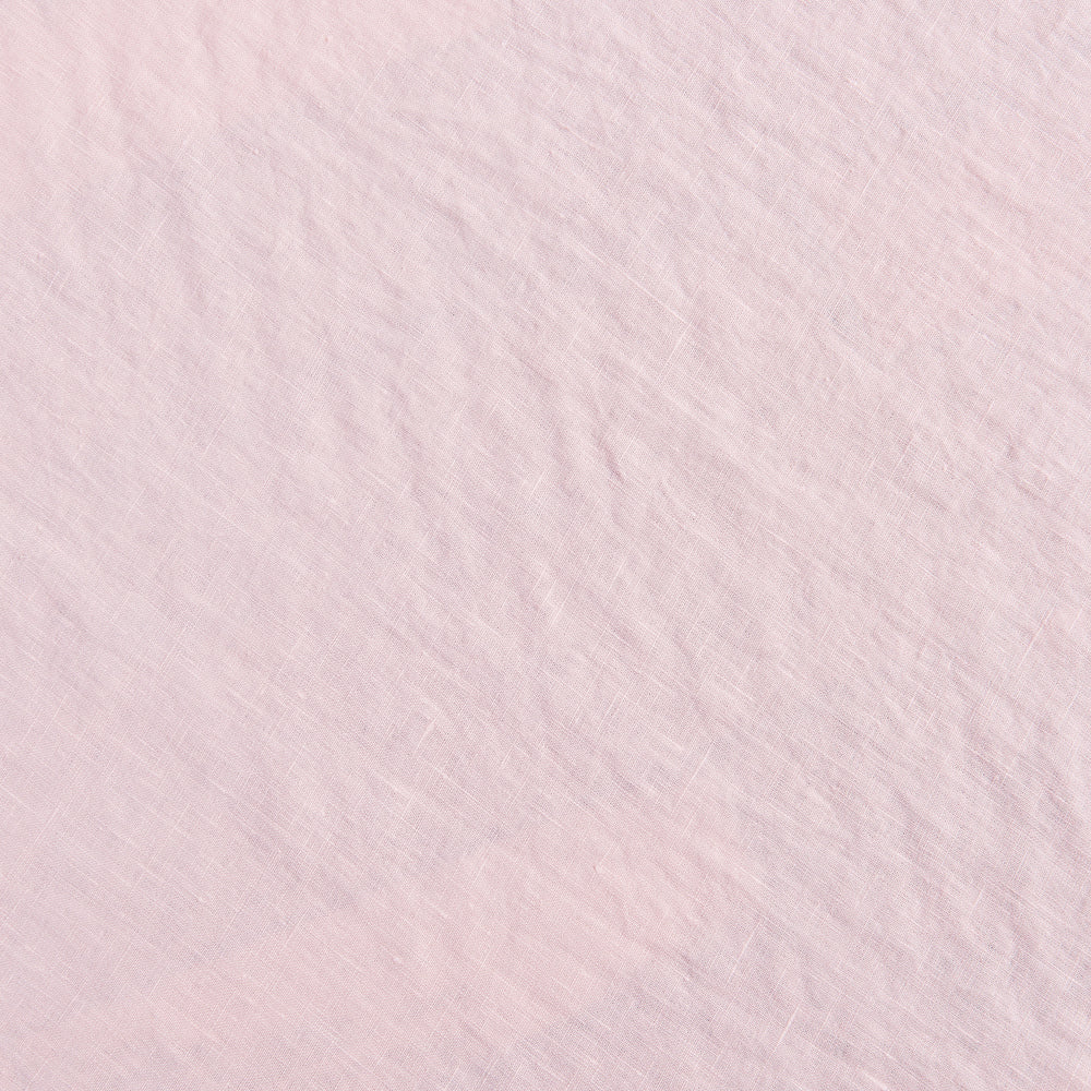 Close up of 100% linen fabric in peach