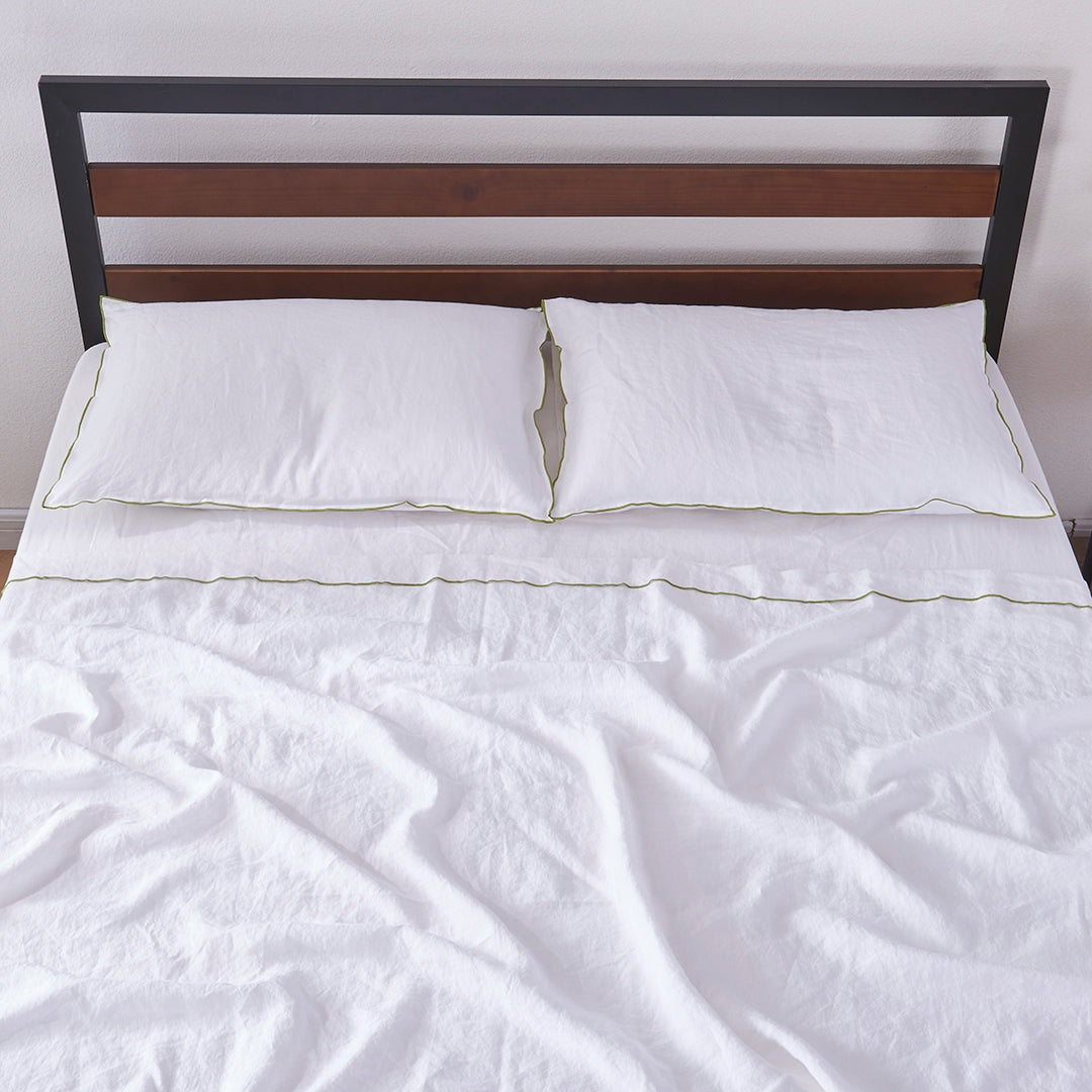 White Linen Flat Sheet and Pillowcases with Leek Green Embroidered Edge