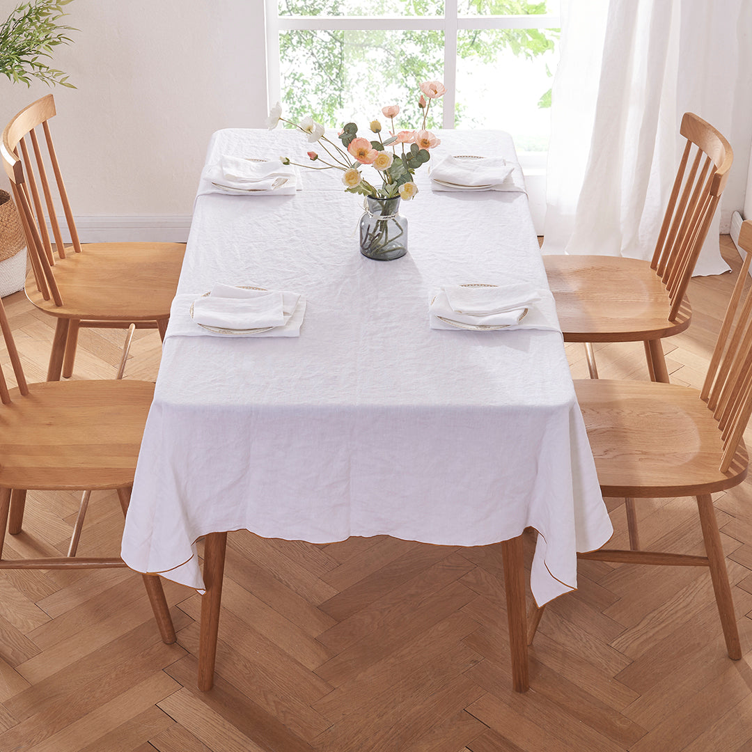White Linen Tablecloth with Mustard Yellow Embroidered Edge in Dining Room