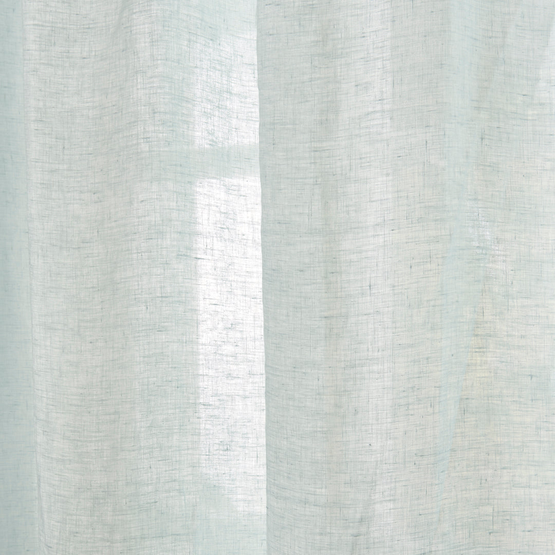 Close-up detail of 100% linen pale blue curtain