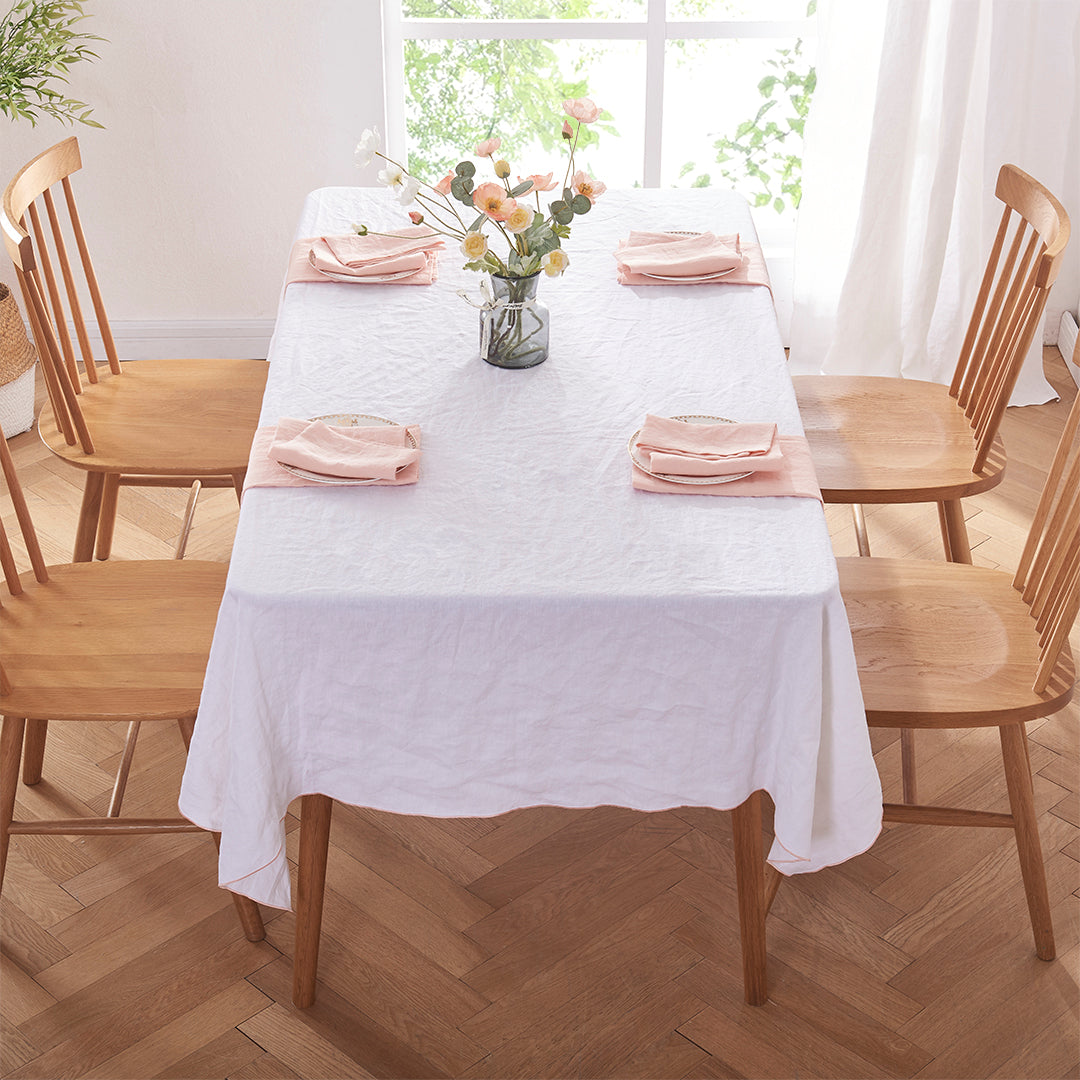 White Linen Tablecloth with Peach Embroidered Edge Set with Peach Placemats and Napkins