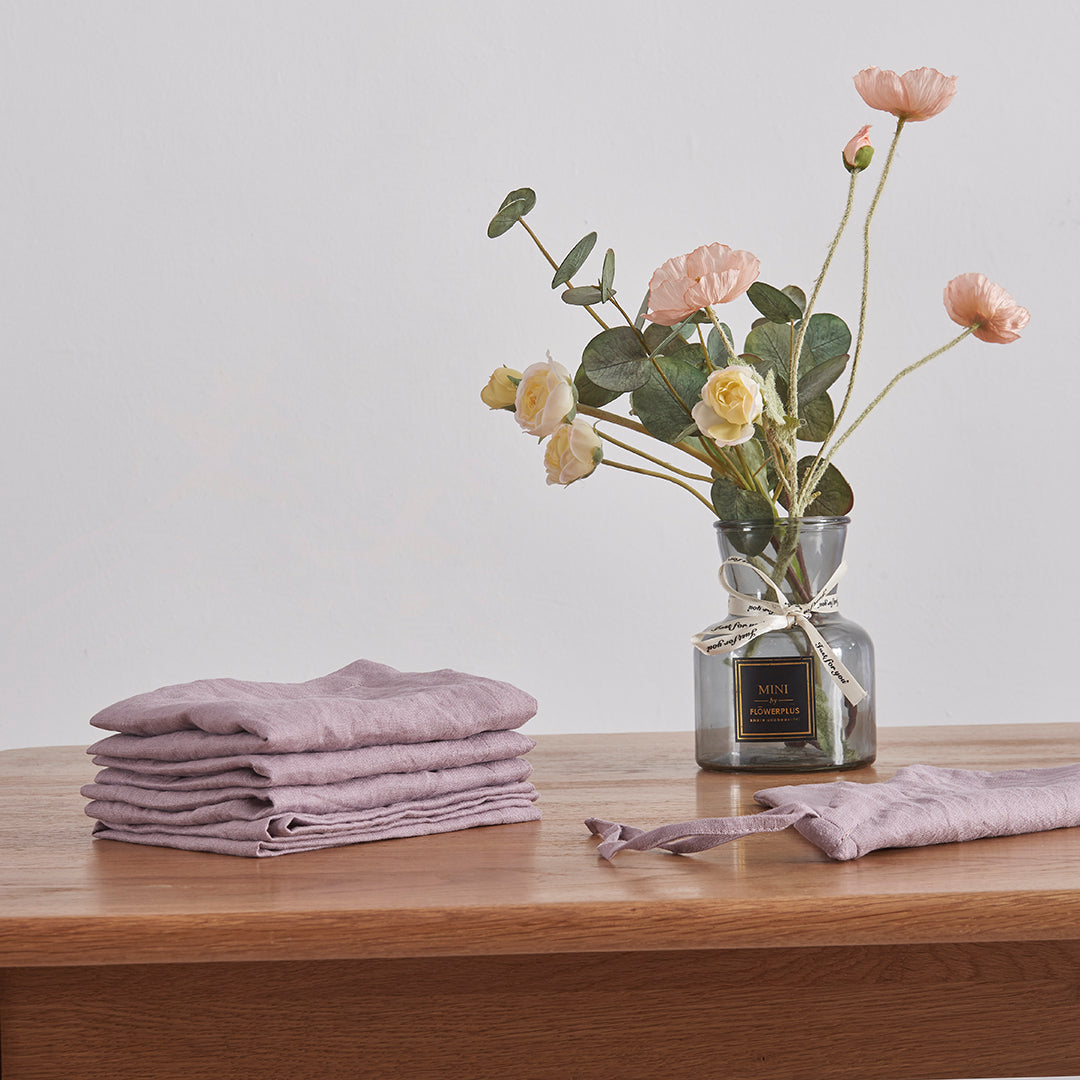 Folded Lilac Linen Placemat Set on Table