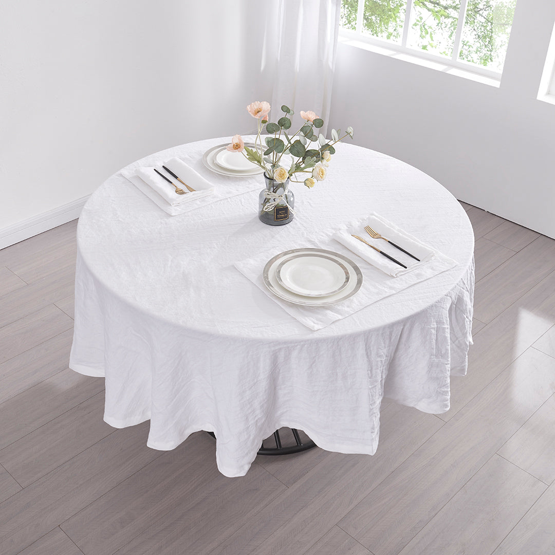 Round Optic White Linen Tablecloth on Table