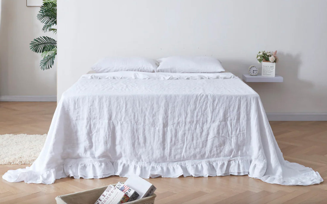 White Linen Ruffle Hem Coverlet on Bed