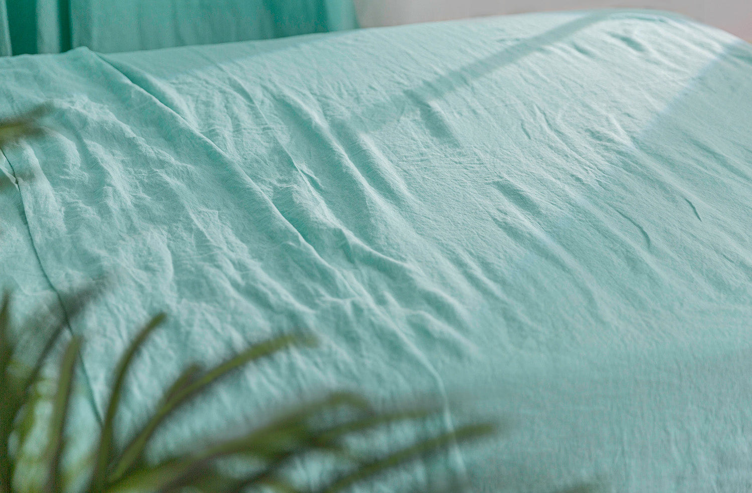 Aqua Green Linen Flat Sheet on Bed