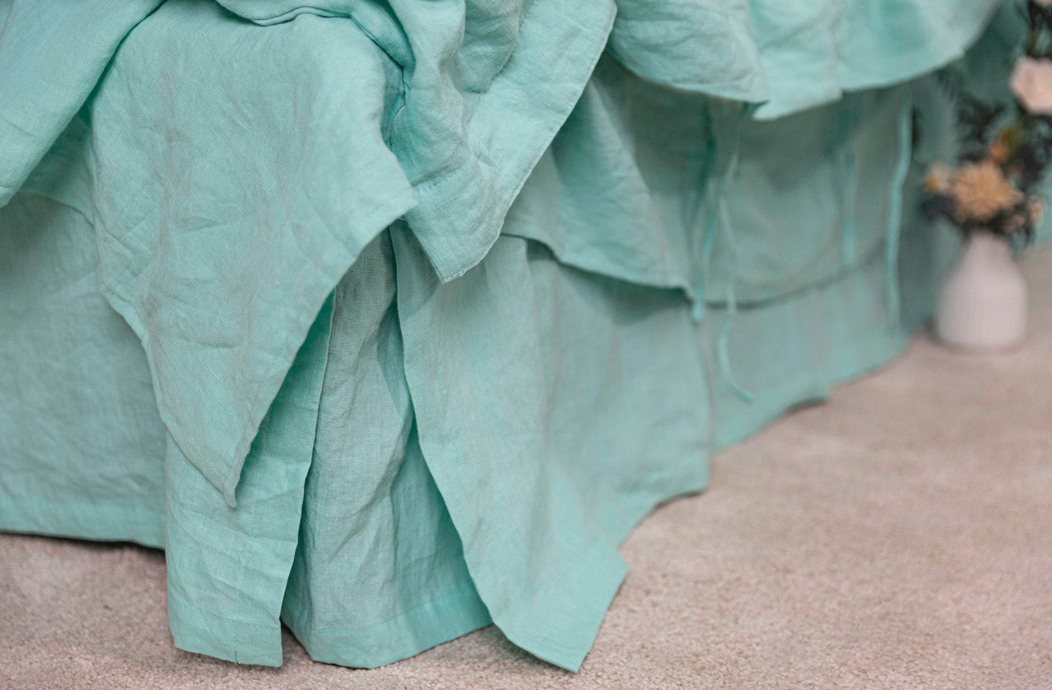 Aqua Green Linen Bedskirt on bed