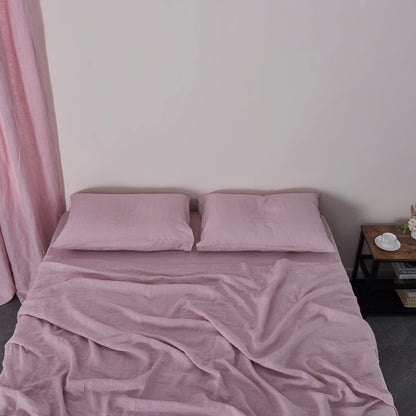 Violet Linen Sheet Set On Bed