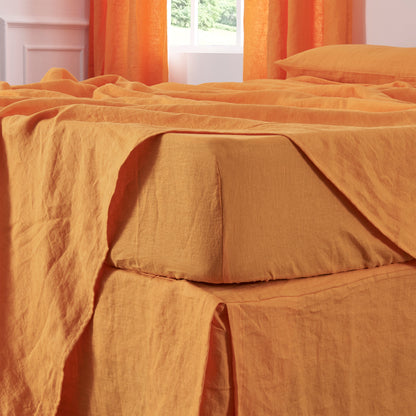 Tangelo Orange Linen Fitted Sheet on Bed