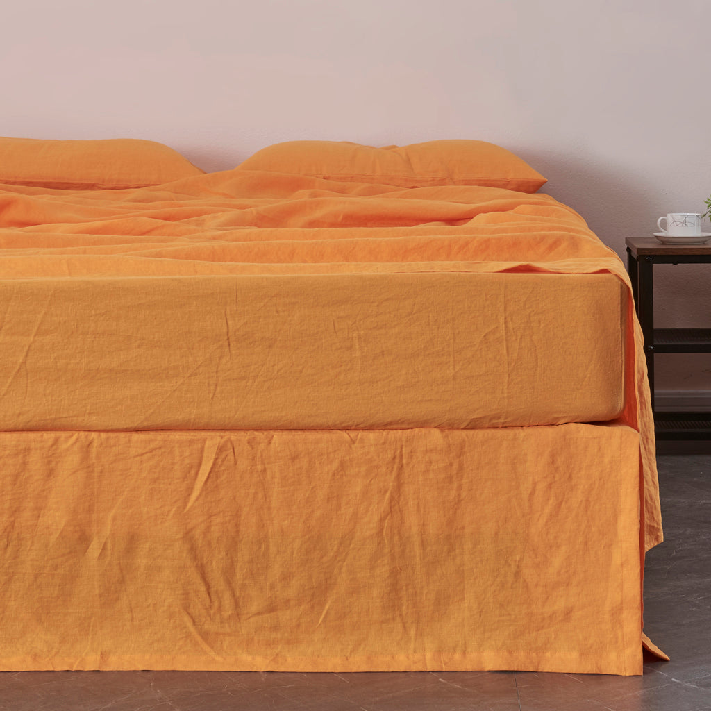Front View Of Tangelo 100% Linen Bedskirt With Split Corner on Bed - linenforce