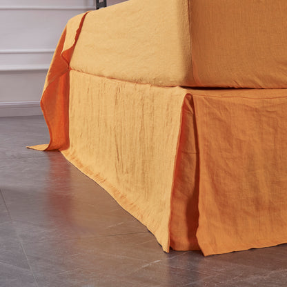 Tangelo Orange Linen Bedskirt With Split Corner on Bed