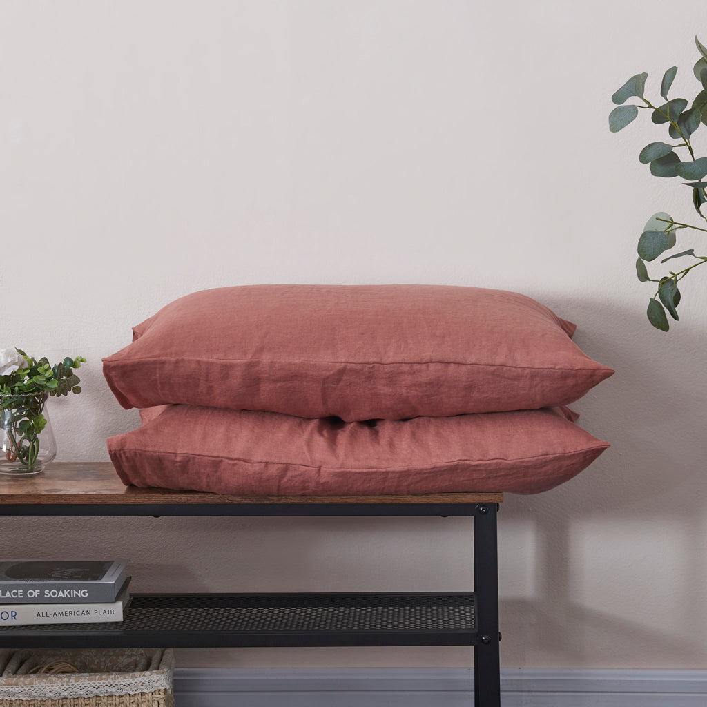 Rust Red 100% Linen Housewife Pillowcases Pair on a Bench- linenforce