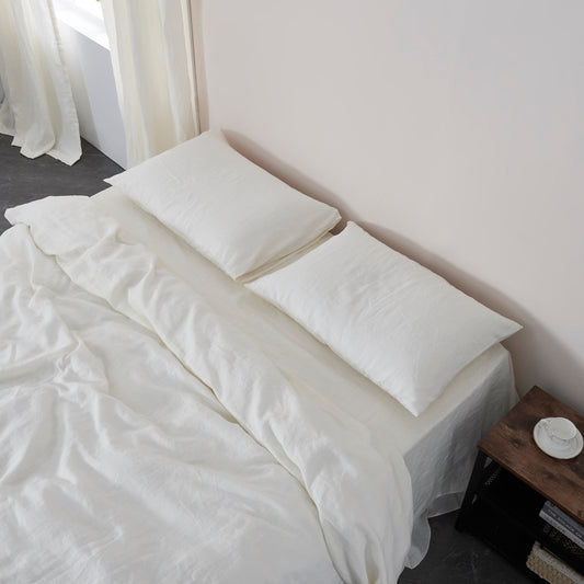 Ivory White Linen Pillowcases on Bed