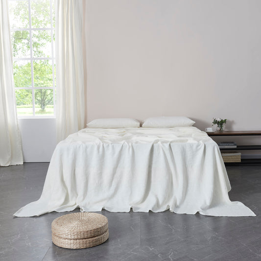 100% Linen Ivory White Flat Sheet on Bed