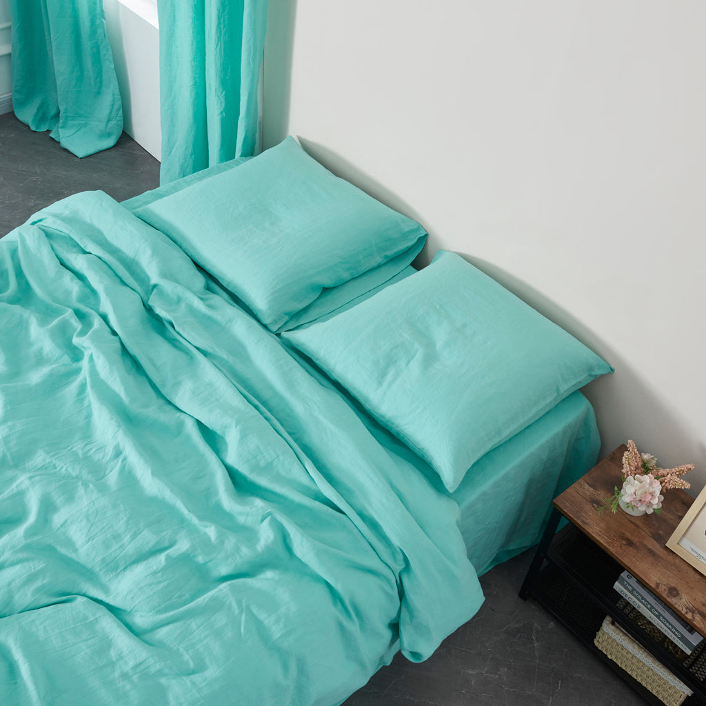 Aqua Green Linen Housewife Euro Pillowcases on Bed