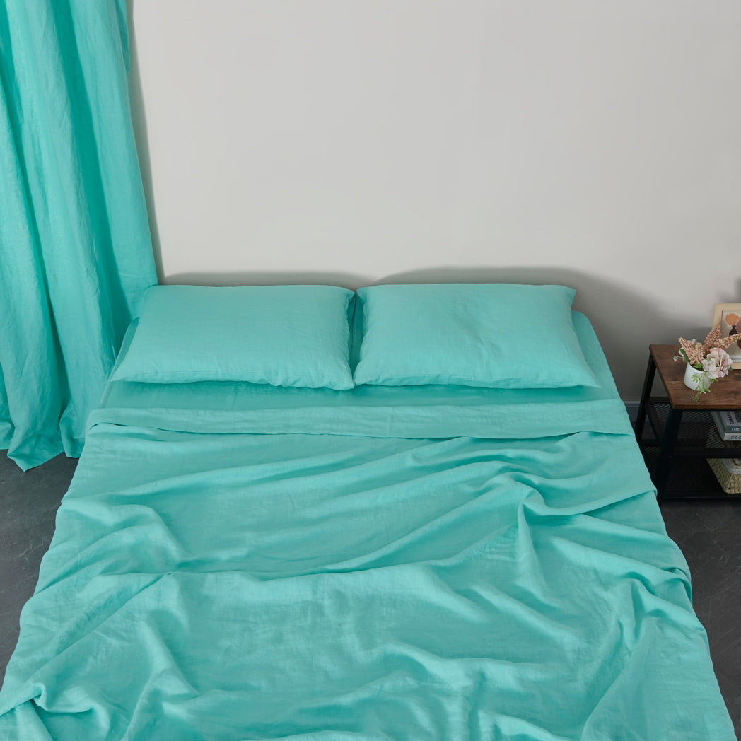 Aqua Green 100% Linen Sheet Set on Bed - linenforce