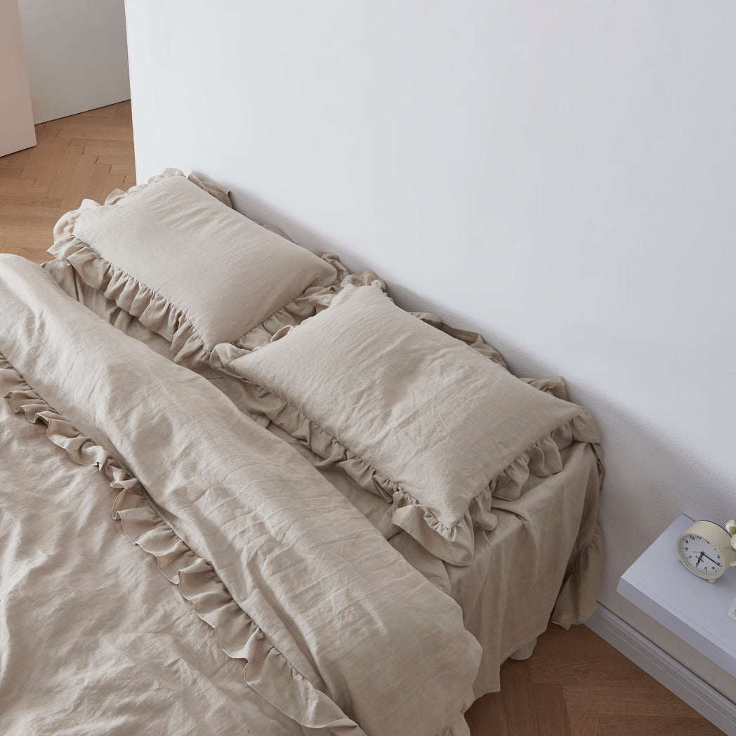 Natural Linen Pillowcases with Ruffle Hem on Bed