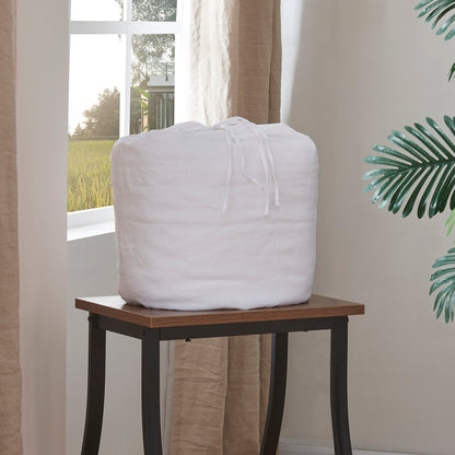 White Linen Quilted Bedspread Folded on Chair - linenforce