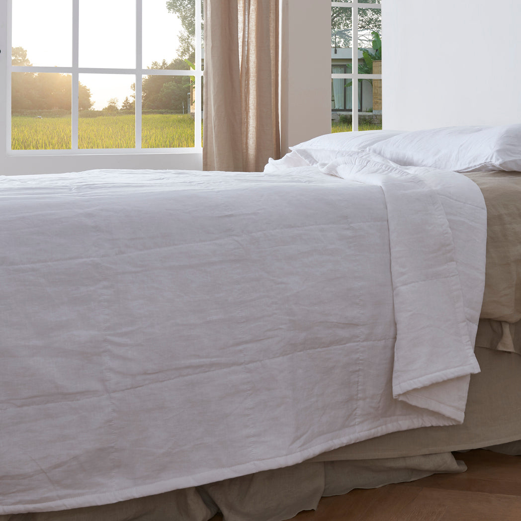 Side View of White Linen Quilted Bedspread - linenforce