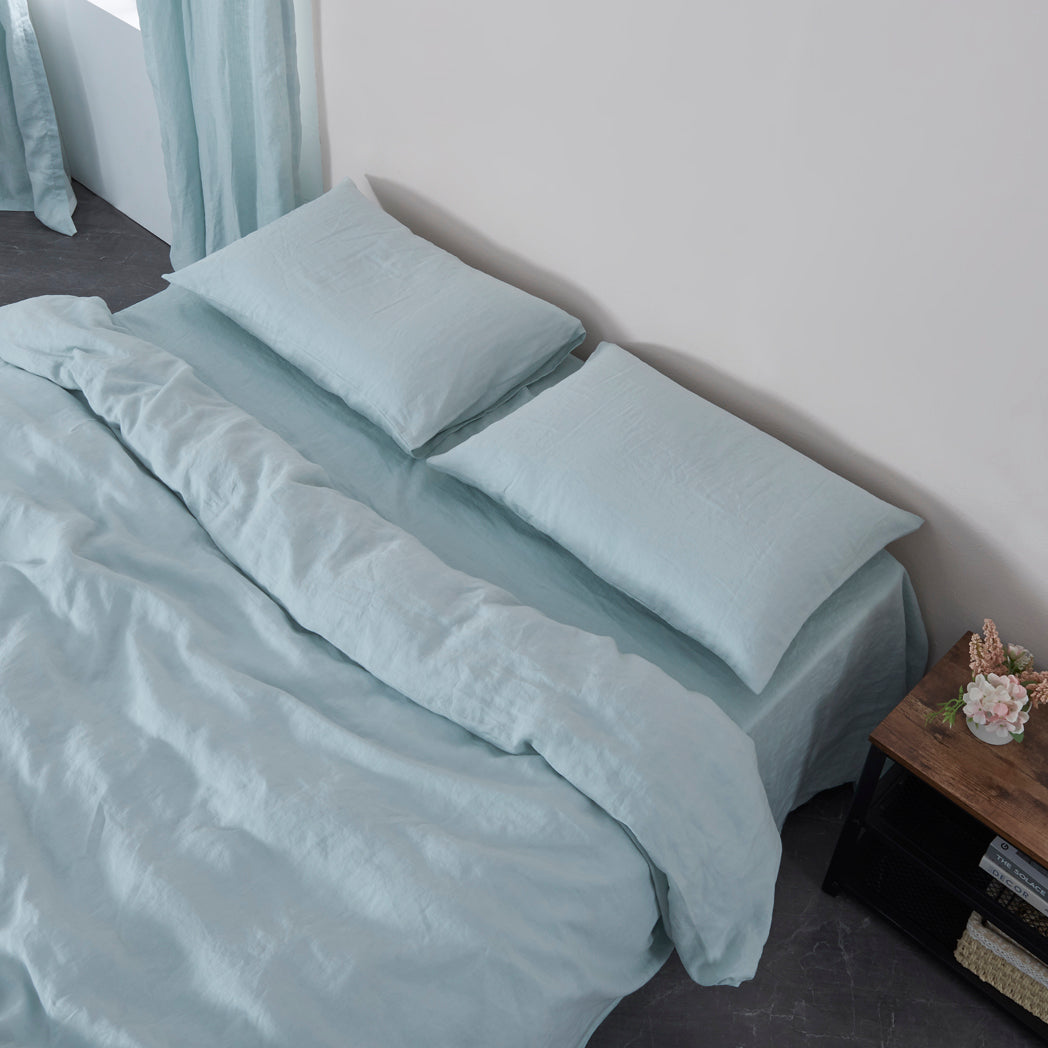 Pale Blue Linen Pillowcases on Bed