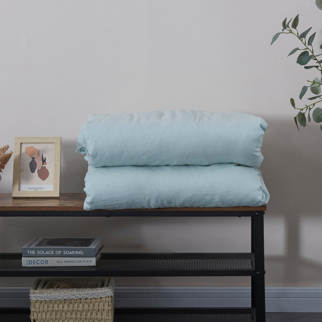 Folded Pale Blue Linen Duvet Cover With Ties