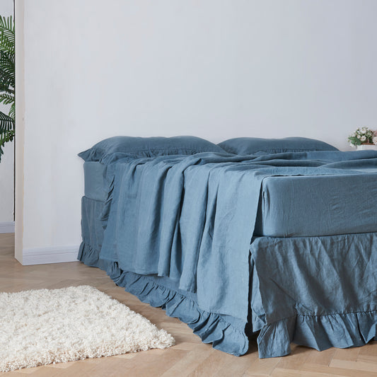 French Blue Linen Bedskirt with Ruffle Hem on Bed