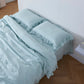 Pale Blue 100% Linen Ruffle Hem Pillowcases On Bed - linenforce