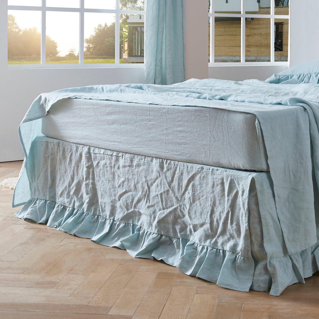 Pale Blue Ruffle Hem Linen Bedskirt on Bed